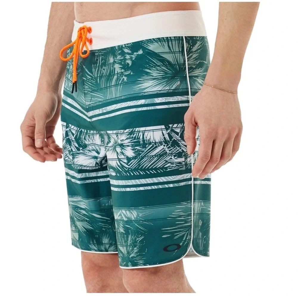 Oakley Mens Board Shorts Teal Green Tropical Palm Stripe Swim Trunks sz 36 Beach